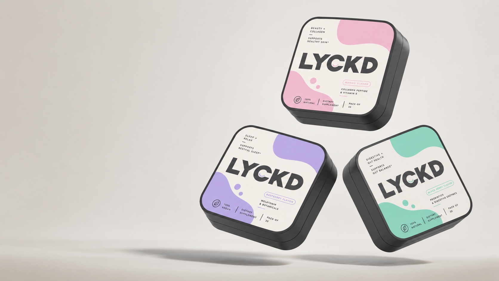 Three LYCKD wellness strip products floating on a light backdrop